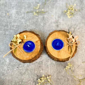 Rustic wooden tealight holders with blue colour tealights and same colour original dry flowers detailing